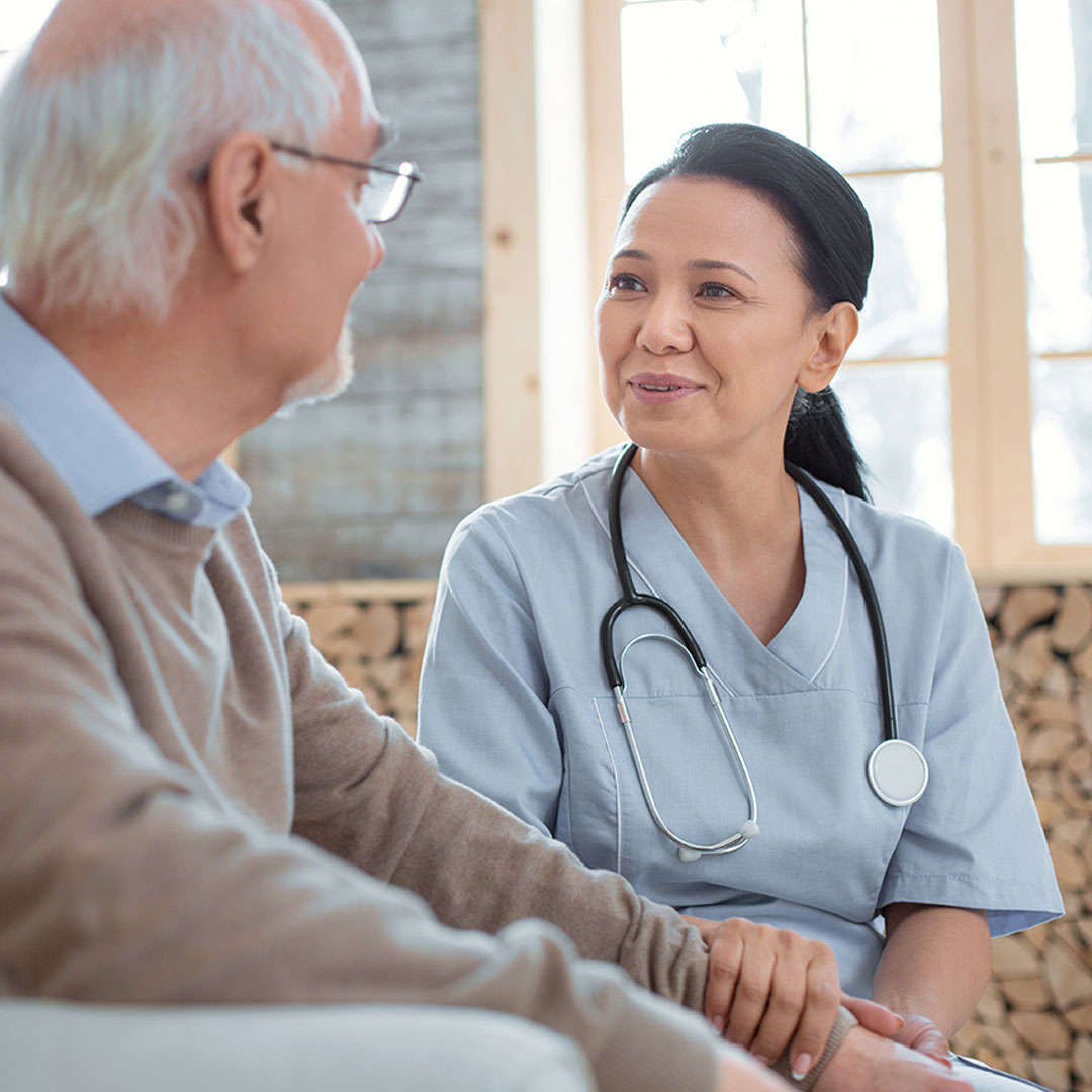 A doctor comforting a patient