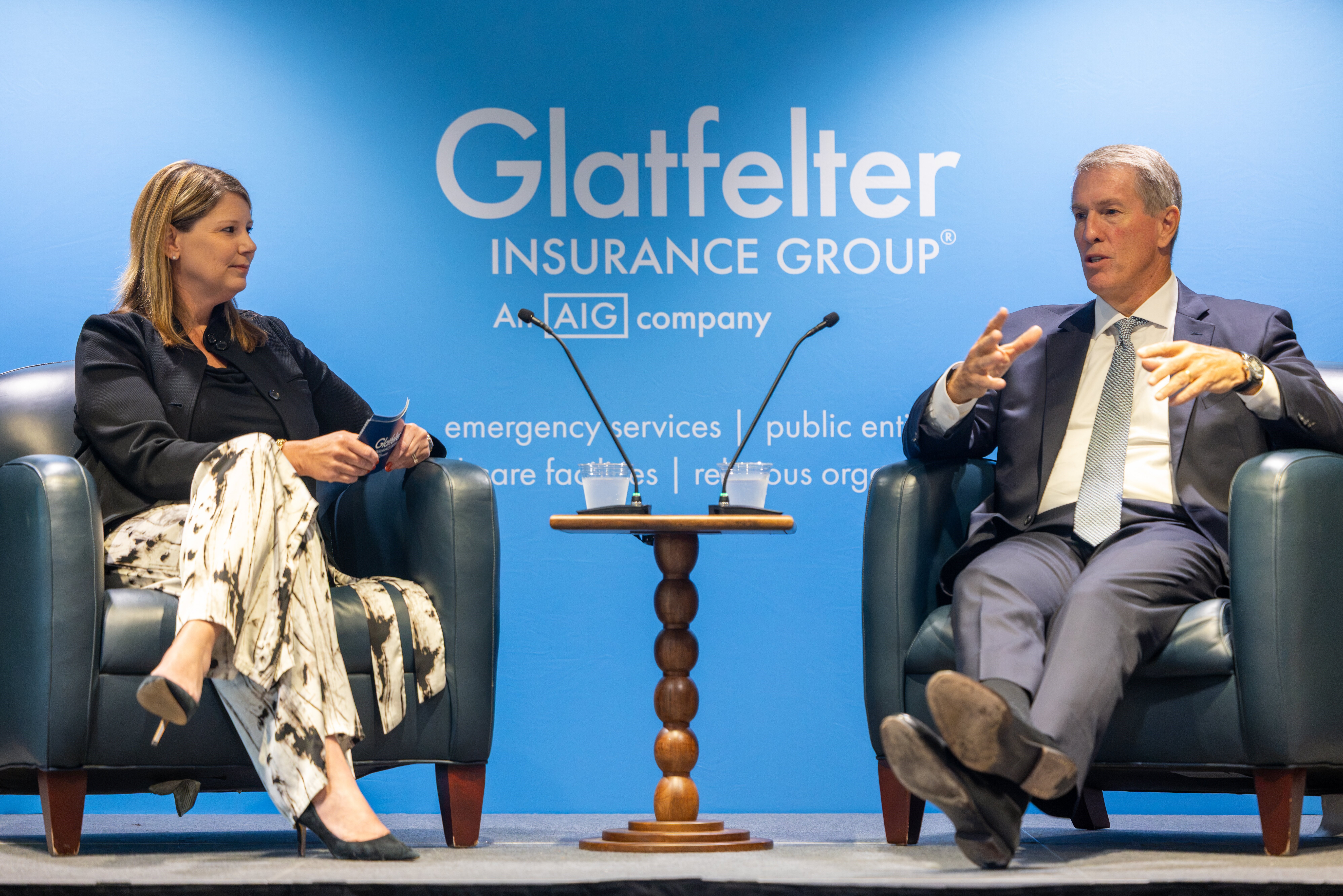 image of Glatfelter CEO Erin Fry sitting down and having a conversation with AIG President and CEO Eric Andersen during his visit to the Glatfelter Insurance Group campus.